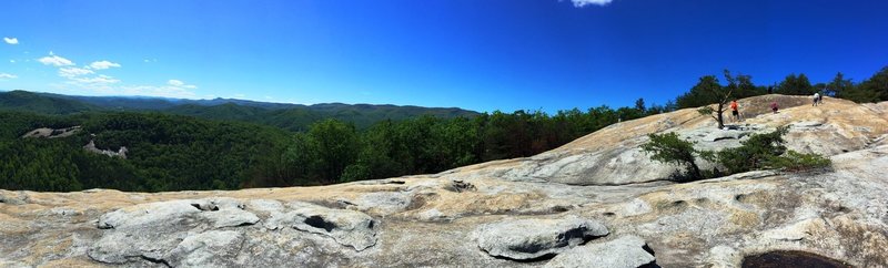 The summit of Stone Mountain offers beautiful views of Wolf Rock in the background.