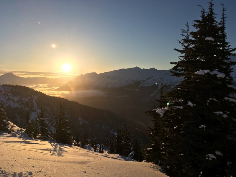 The sun sets over Mount Alpenglow and the Girdwood Valley.