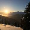 The sun sets over Mount Alpenglow and the Girdwood Valley.