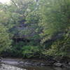 Earlier on, the trail runs along the ridge across the water.