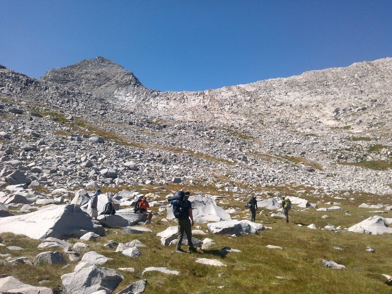 The group traverses along the southwest shore of Martha Lake.