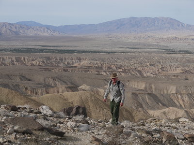 A hiker ascends the ramp to Mine Peak.