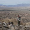 A hiker ascends the ramp to Mine Peak.