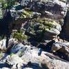 A waterfall cascades through Forsythe Canyon.