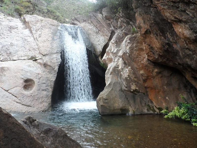 Ostra Waterfall cascades into the stream below.