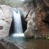 Ostra Waterfall cascades into the stream below.