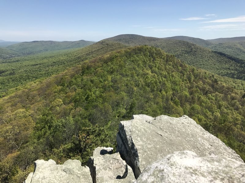 This rock outcropping provides an excellent vantage point overlooking the nearby tree covered hills.