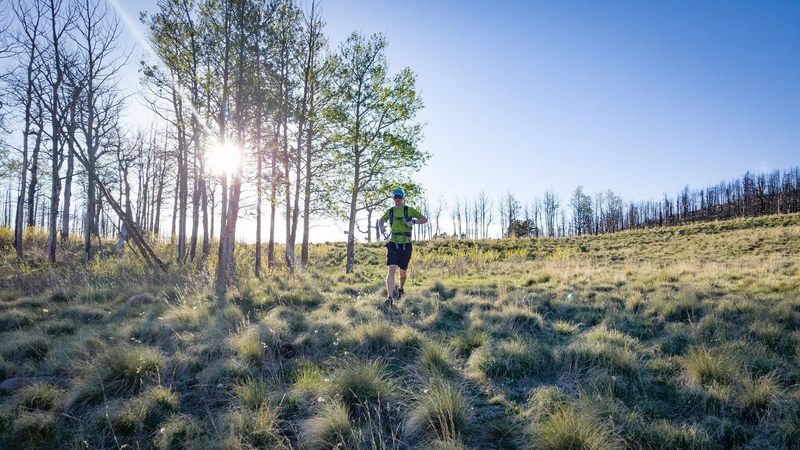 Running the sweet singletrack near the saddle of Cañon de Valle. The saddle is between Cerro Grande and Pajarito Mountain and allows easy access into the Valles Caldera.