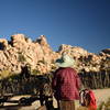 A visitor enjoys the views during a ranger-led tour of Keys Ranch. Photo credit: NPS/Hannah Schwalbe.