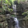 Lost Sinks Waterfall trickles peacefully over the rocks below.