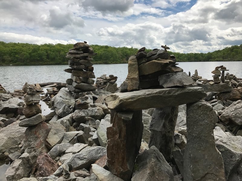 Someone built one or two cairns along the pond's edge.