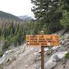 An informative sign marks the route to Browns Lake and the waterfall.