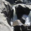 Cool rock formations are carved by the water at Vale da Lua.