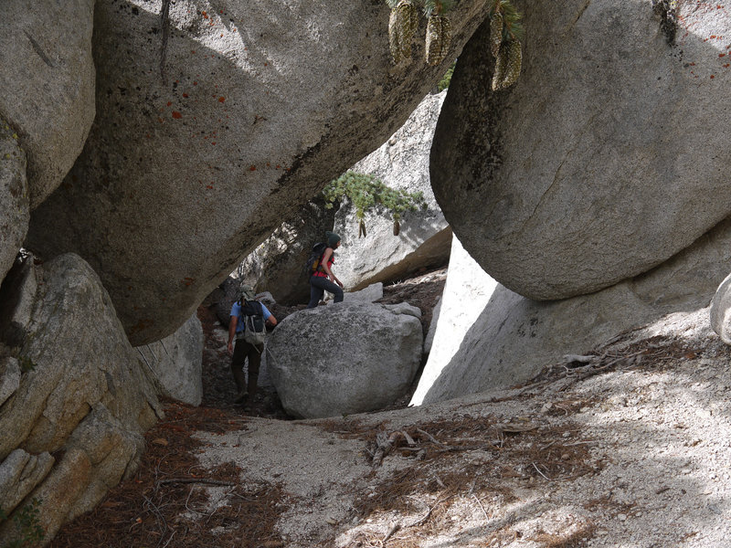 Two hikers scramble up to Fuller Ridge.