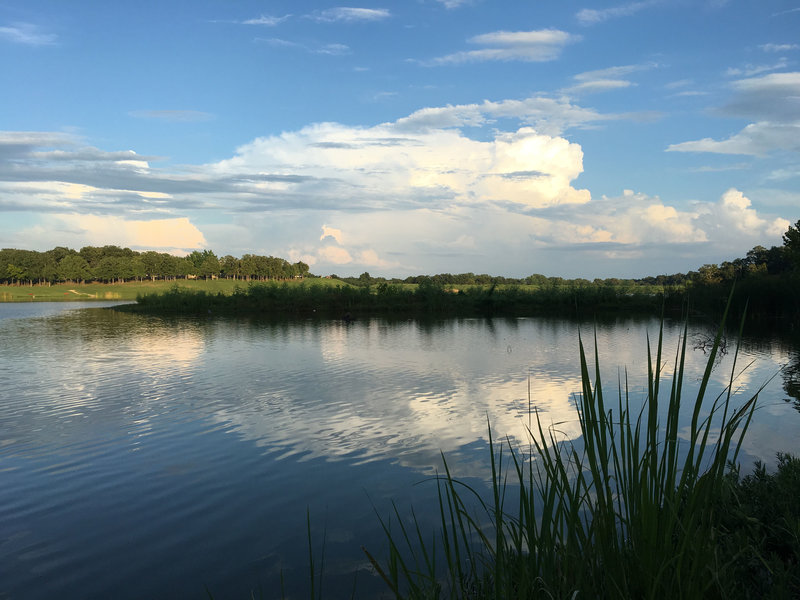 Sunshine breaks through the clouds on a beautiful spring day at Waterloo Lake.