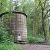 An old water tank lives right near the parking area.