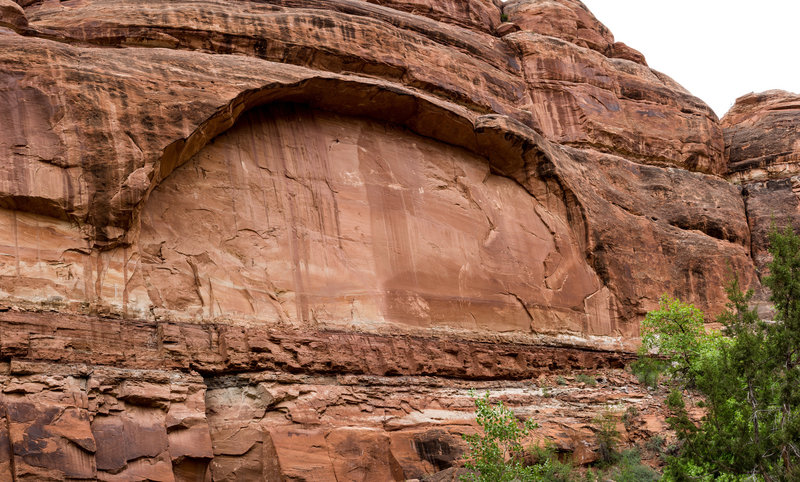 An arch begins to take form in the wall of Owl Creek Canyon.