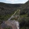 Spring runoff flows near the south end of the trail.