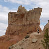 The rock fins on the Peekaboo loop tower over visitors.