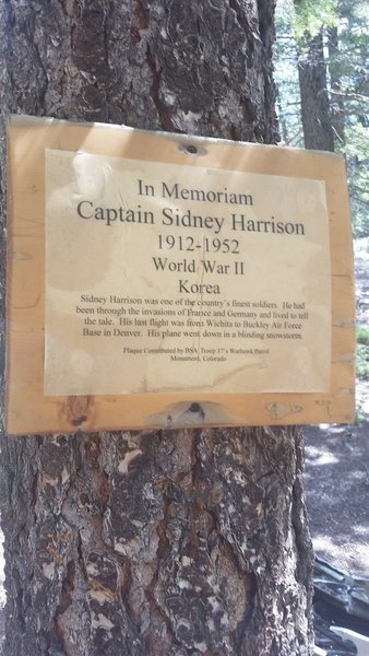 A sign about in memoriam of Captain Sidney Harrison.