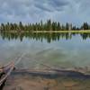 A sunken log lurks beneath the surface of Deadman Lake.