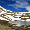 Snow lingers on the summit above Lower Square Top Lake in early summer 2017.