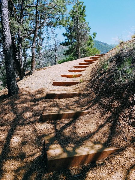 Winding stairs on trail assist you with the ascending terrain.