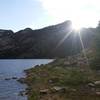 The sun sets over Bass Lake in early July.