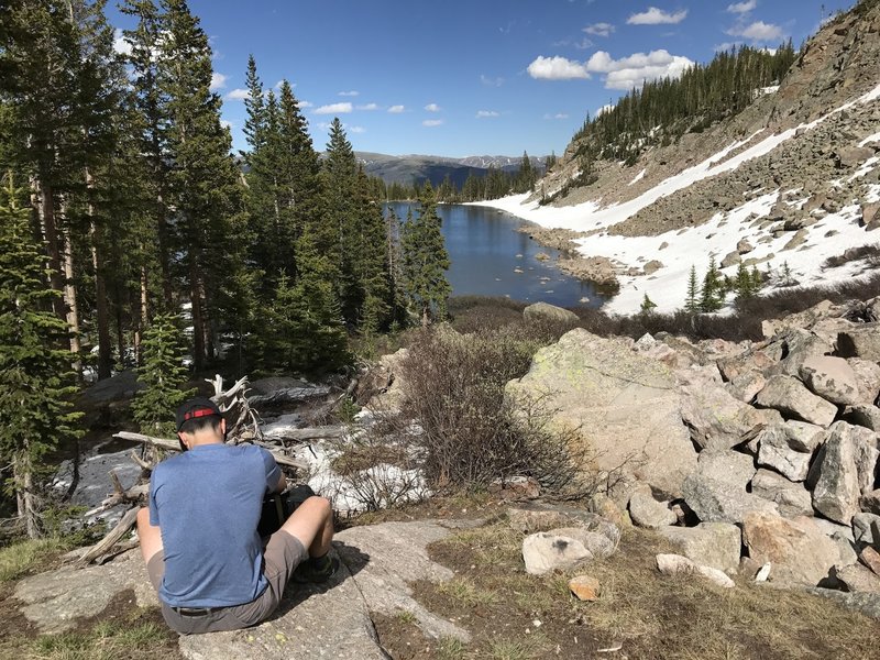 Having a quick snack perched above the west end of Salmon Lake.