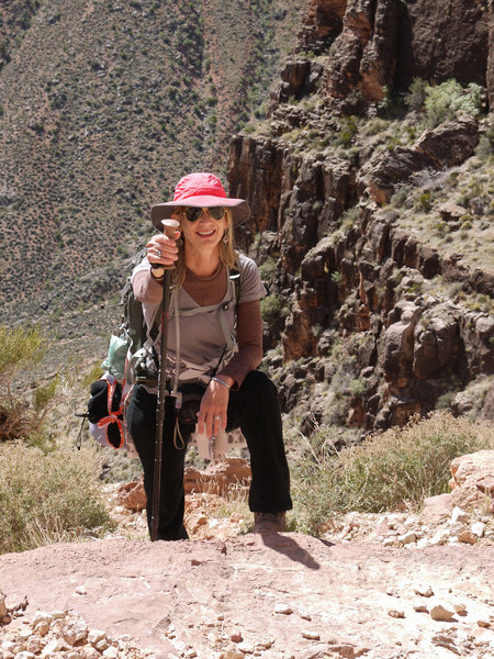 A hiker puts on a brave face for the long ascent of the South Kaibab Trail.