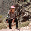 A hiker puts on a brave face for the long ascent of the South Kaibab Trail.