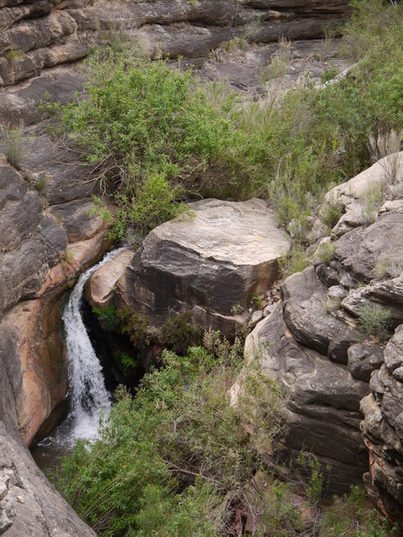 A waterfall cascades in the Devil's Corkscrew region of the Bright Angel Trail.