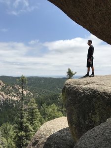 A large boulder outcropping on Shaylyn Ridge provides great views of Devil's Thumb.