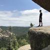 A large boulder outcropping on Shaylyn Ridge provides great views of Devil's Thumb.