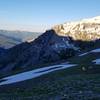 There's a nice flat spot to camp just downhill of the ridge looking toward Sheep Creek Peak.