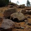 West of the seventh bridge, the trail is replete with boulders. Some scrambling is required.