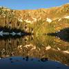 The sun rises over Bowen Lake.