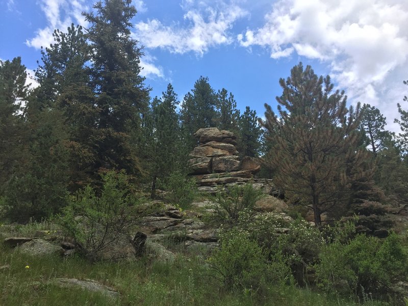 A large stack of rocks can be seen just off the Forsythe Canyon Trail.