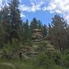 A large stack of rocks can be seen just off the Forsythe Canyon Trail.