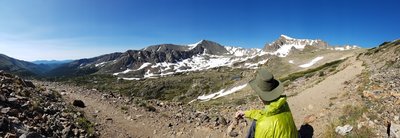 This panorama looks down to the valley/trailhead, and up toward Arapahoe Pass.