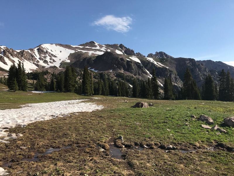 This view is looking back at Red Peak from one of the lakes below Eccles Pass.