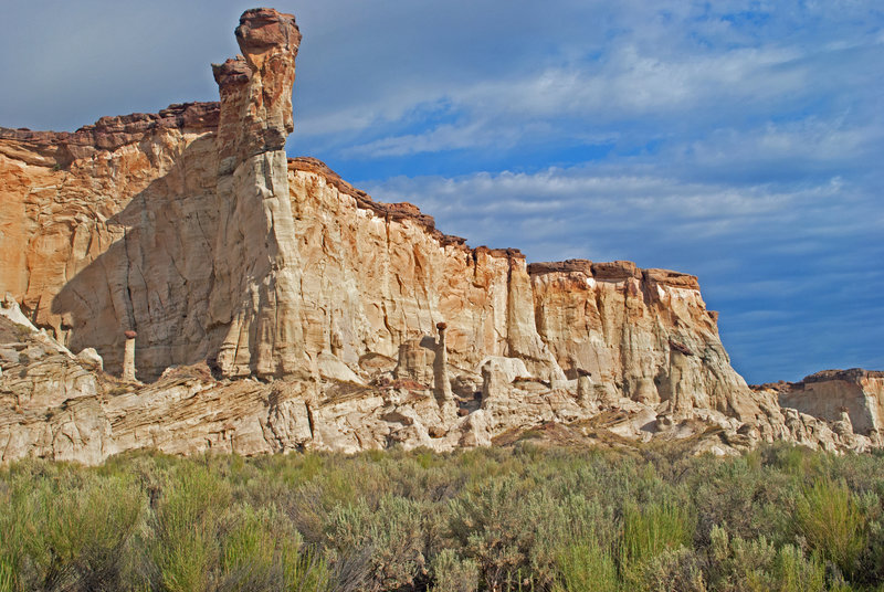 This is Group 1 of the Wahweep Hoodoos beneath the towering buttress.