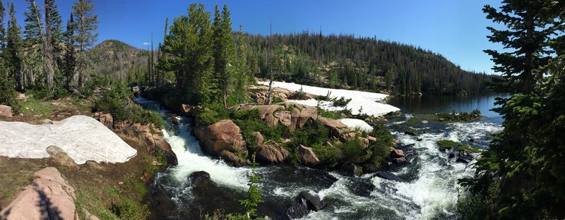 A waterfall cascades between the two lakes.