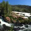 A waterfall cascades between the two lakes.