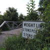 Original bridge that crossed the river to the first lodge.