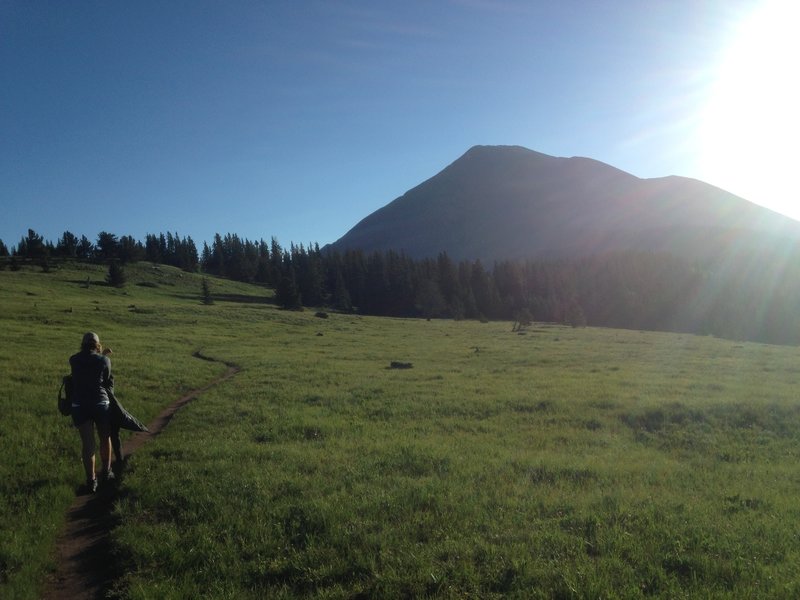 Early crossing of meadow. West Spanish Peak is hard to miss