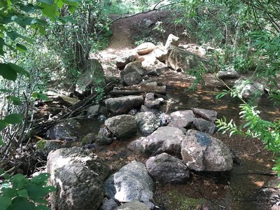 The place near Palmer Lake reservoir trailhead where you cross Monument Creek to start Chautauqua trail.