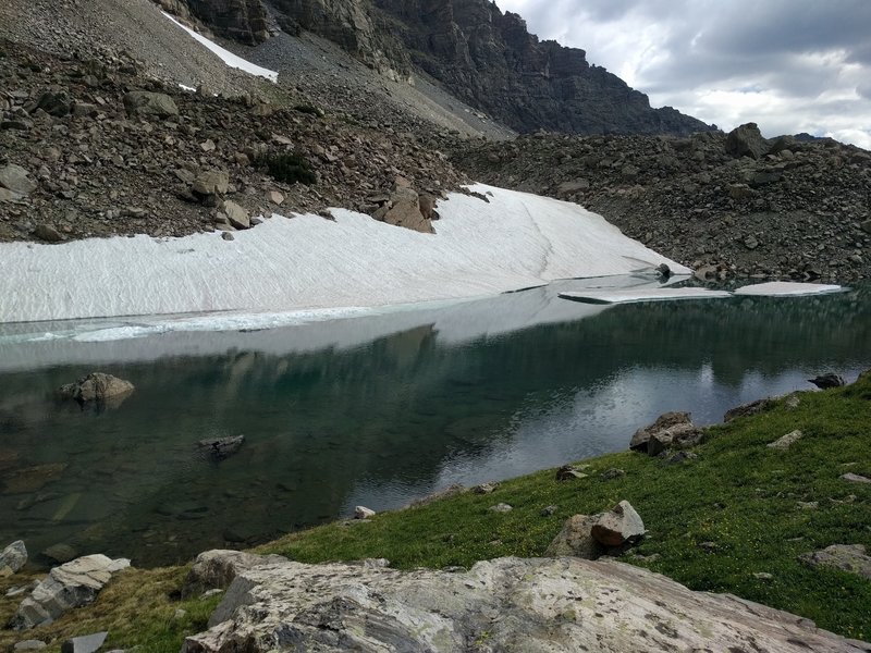 Icy lake at the end of the trail. From here make a scramble to the larger glaciers up valley.