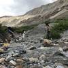 The major creek crossing in Iowa Gulch. Helps to have poles but there are good rocks to walk across.