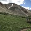 Heading back on the Iowa Gulch Trail with Mount Sheridan in the background.